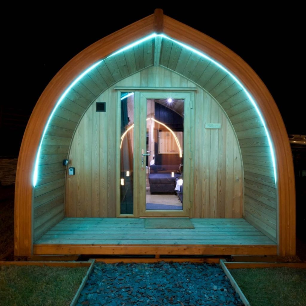 glamping pod with neon lights